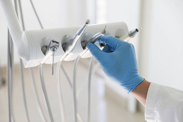 Professional Invisalign Clear Aligners technician working in Miramar Beach, FL